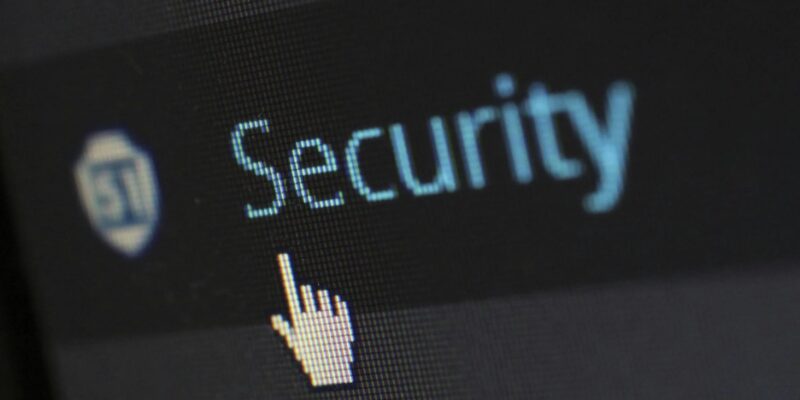 Security logo on a black screen.